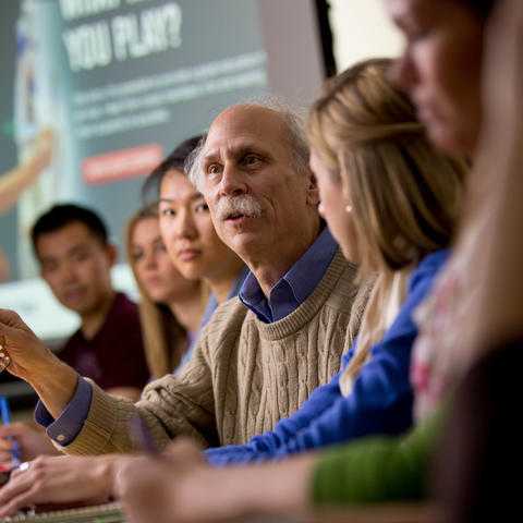 HGSE Professor talking to students in a seminar 